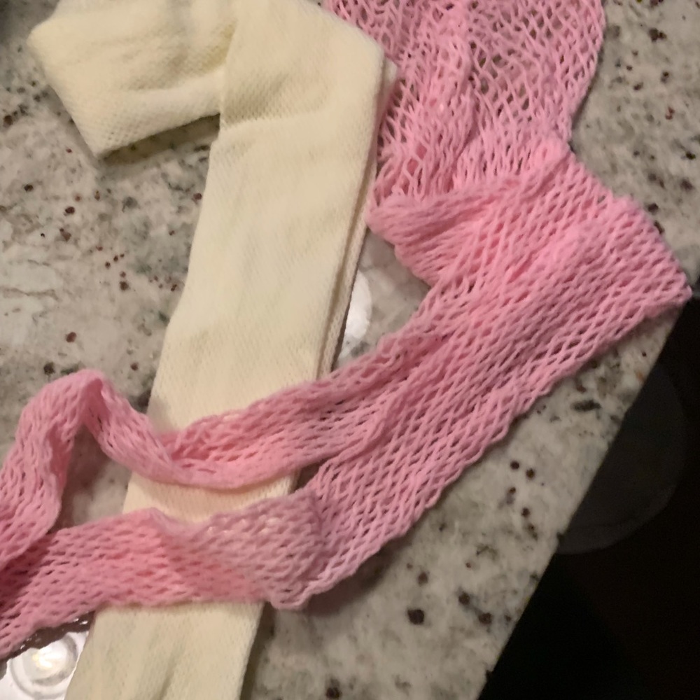 Fun fishnet pantihose, 2pr., pink, cream, size small.